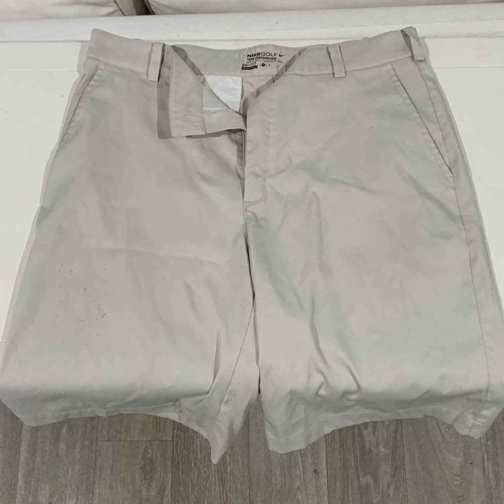 Nike Golf Tour Performance shorts. 32” waist 10 1/2” inseam. Tan color.